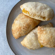 Load image into Gallery viewer, Purchase the ready to bake Peach Turnovers from the Flaky Apple Pie Company and wow all our friends with your baking skills this Holiday Season.