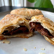 Load image into Gallery viewer, Purchase the ready to bake Nutella Turnovers from the Flaky Apple Pie Company and wow all our friends with your baking skills this Holiday Season.