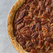 Load image into Gallery viewer, Make Thanksgiving a breeze with our ready-to-bake Pecan Pie from Flaky Apple Pie Company. Delight your friends and family with this effortless, delicious holiday treat that YOU baked. Best pecan pie in Orange County, Ca.