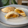 Load image into Gallery viewer, Purchase the ready to bake Peach Turnovers from the Flaky Apple Pie Company and wow all our friends with your baking skills this Holiday Season.