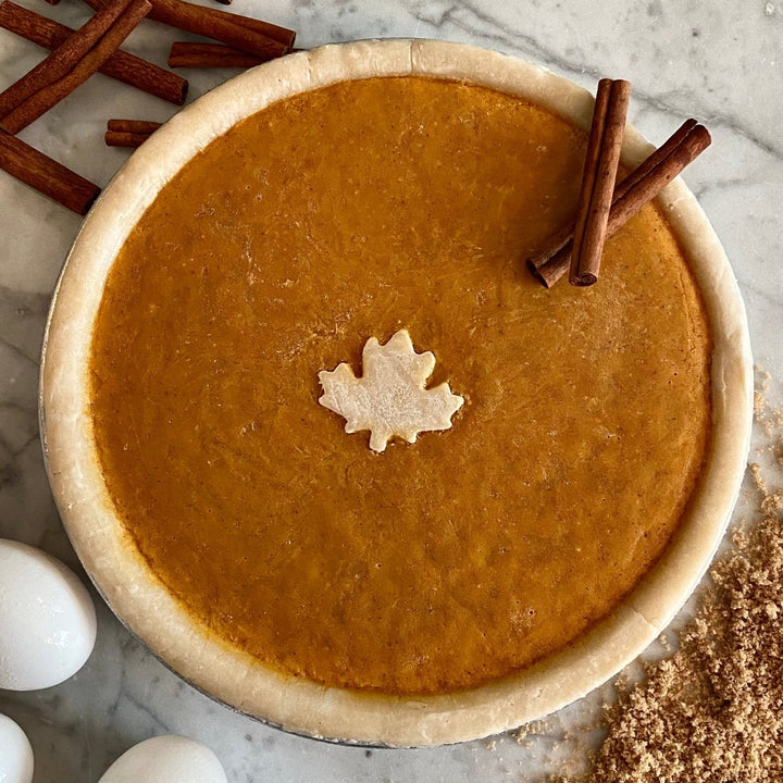 Make Thanksgiving a breeze with our ready-to-bake Gluten Free Pumpkin Pie from Flaky Apple Pie Company. Delight your guests with this effortless, delicious holiday treat that you baked!