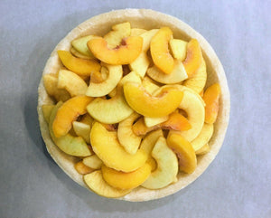 Make dessert a breeze with our ready-to-bake Peach Apple Crumb Pie from Flaky Apple Pie Company. Delight your friends and family with this effortless, delicious treat that you baked!