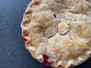 baked peach and raspberry pie from the flaky apple pie co