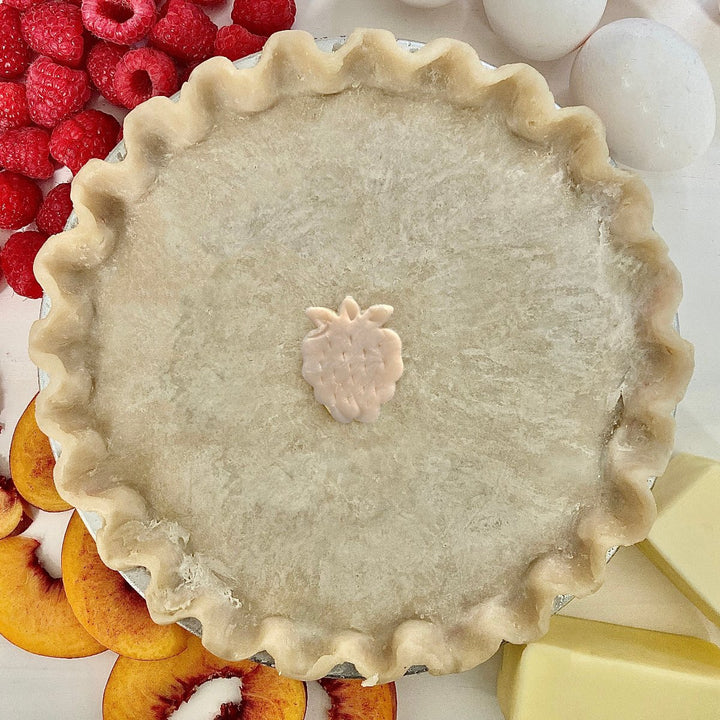 peach and raspberry pie from the flaky apple pie co